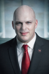 Sinister professional with a sharp gaze.png